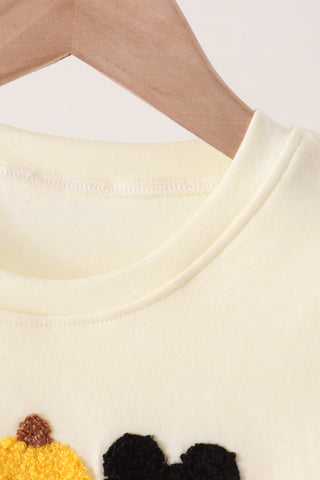 Beige character french knot top