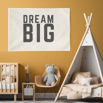 yellow child bedroom with "dream big" wall flag hanging up