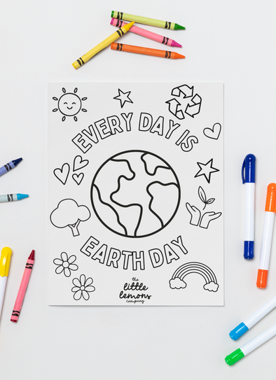 a picture of a earth day coloring page surrounded by crayons and markers