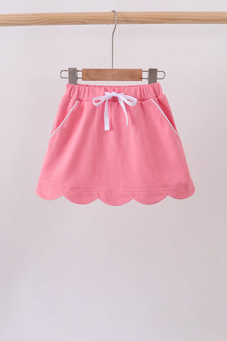 Deep pink scallop hem bow skort