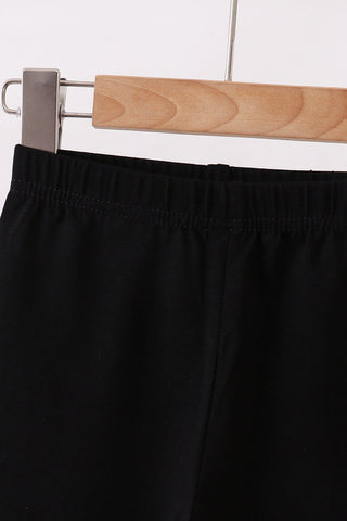 Black ruffle pants