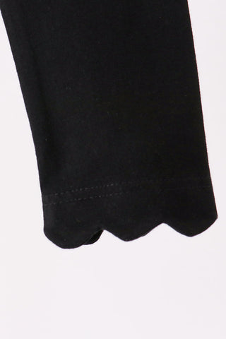 Black scalloped leggings