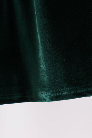 Green velvet bow dress