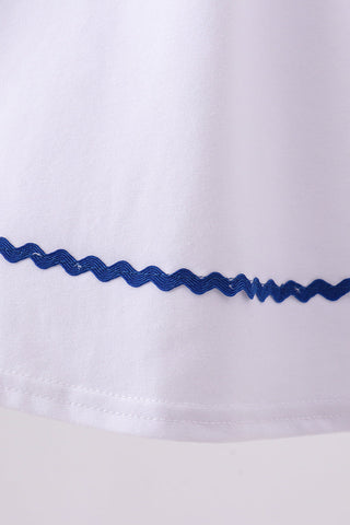 White flag smocked ruffle dress
