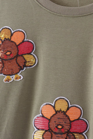 Green turkey sequin mom&me top